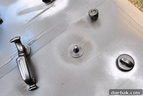 Transform Your Hardware with Spray Paint 13 Newly sprayed door hardware after curing