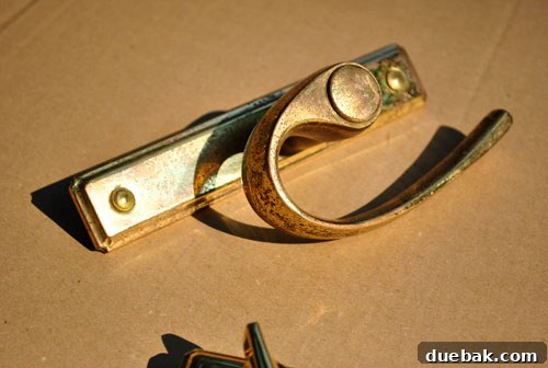 Transform Your Hardware with Spray Paint 3 Close-up of rusted old door handle
