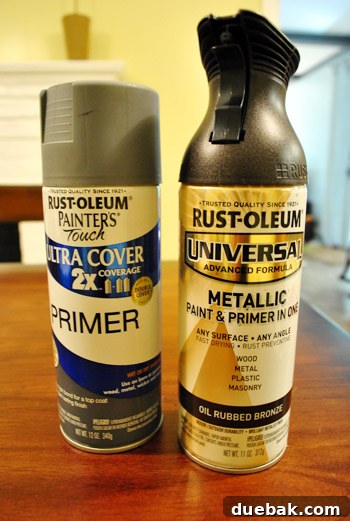 Transform Your Hardware with Spray Paint 9 Can of Oil-Rubbed Bronze spray paint with 'paint & primer in one' label