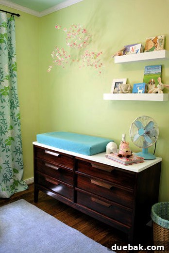 Another perspective of the nursery in the first house, showcasing thoughtful details