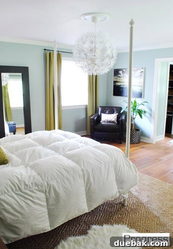 Corner of the current master bedroom, showing the mirror and sink area, hinting at attached bathroom