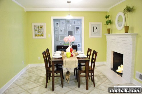 Spacious kitchen in the current house, featuring a fireplace and ample room, awaiting a major overhaul