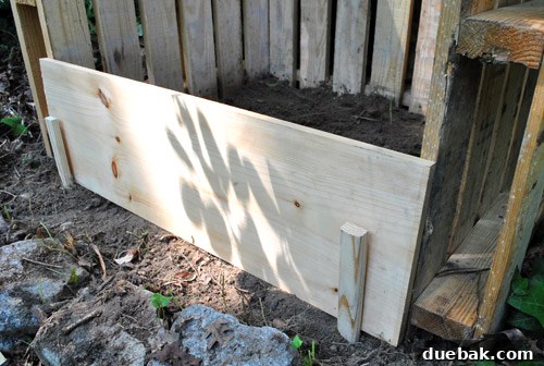 Turn Pallets Into Garden Gold 14 Improvised front wall with scrap wood and stakes