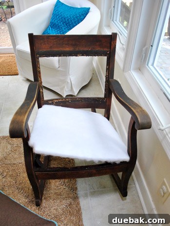 The upholstered seat not fitting into the chair frame due to thickness