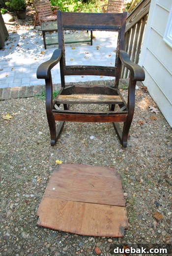 Stripped rocking chair frame, showing bare wood and structural elements
