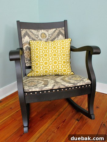 Transform Your Rocking Chair with Fabric and Nailhead Upholstery 22 Rocking chair styled with a patterned yellow pillow
