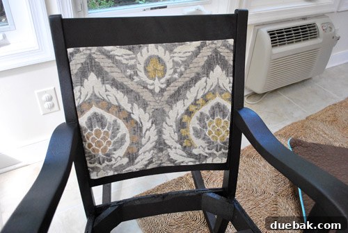 Transform Your Rocking Chair with Fabric and Nailhead Upholstery 8 Close-up of the stapled upholstered panel showing rigidity
