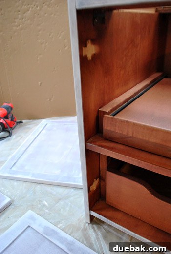 Cabinet Painting Prep for a Perfect Finish 15 Primed cabinet frame, showing normal uneven primer appearance