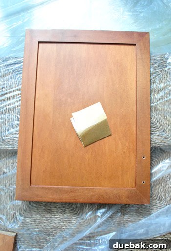 Cabinet Painting Prep for a Perfect Finish 4 Sanding cabinet doors by hand to remove gloss