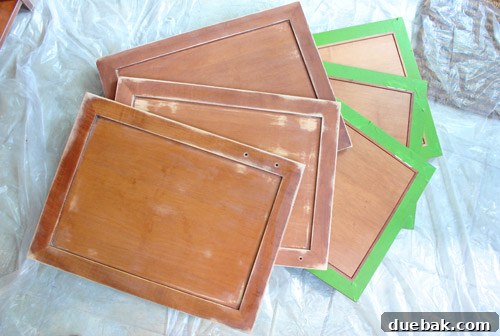 Cabinet Painting Prep for a Perfect Finish 8 Cabinet doors prepped with Frog Tape for two-tone finish