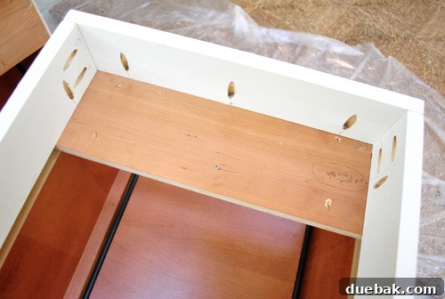 From Thrifted Cabinets to a Massive Shared Desk 6 Kreg jig used to attach the wooden frame to the cabinet top