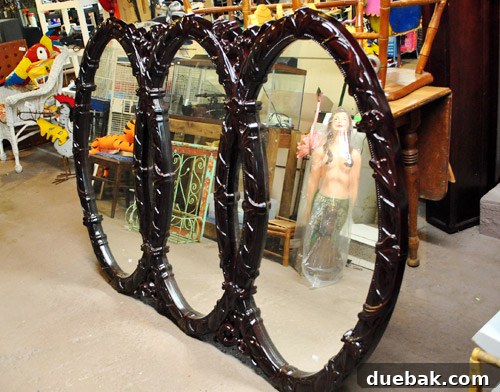 Delaware's Hidden Thrift Treasures 7 Trio of overlapping mirrors inside the Ole Sale Barn, with a creepy plastic mermaid bust reflected