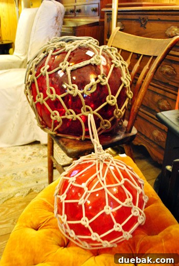 Delaware's Hidden Thrift Treasures 9 Collection of nautical glass buoys displayed at Beach Plum Antiques