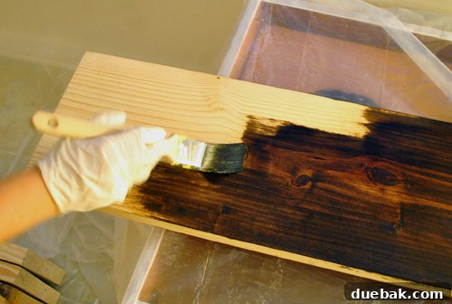 Stain application process with paintbrush