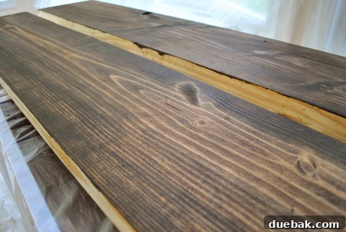 Dried stained wood planks ready for installation