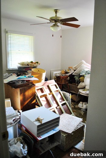 Messy playroom with various items scattered