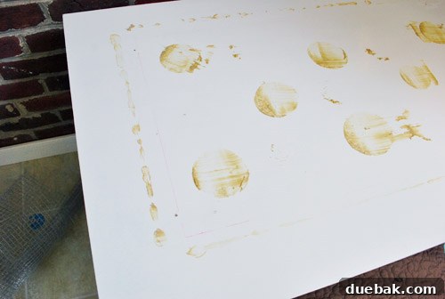 Scraping off fallen mirror adhesive