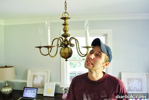 Revitalize Your Old Chandelier With Paint and a Shade Swap 5 Dramatic re-enactment of hitting head on chandelier