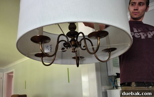 Revitalize Your Old Chandelier With Paint and a Shade Swap 10 Person looking disappointed at the chandelier and shade