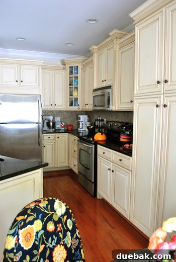 Kitchen close-up showing granite countertops and stainless steel appliances.
