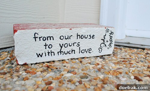 A sentimental brick from the old family home placed on the new doorstep.
