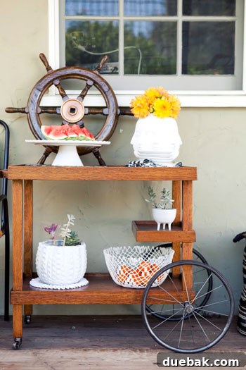 Close-up of a stylish sideboard with unique bike-wheel-like details on Jaime's deck.
