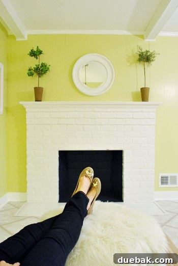 Rendering of a fireplace with a modern electric insert, illustrating a design possibility
