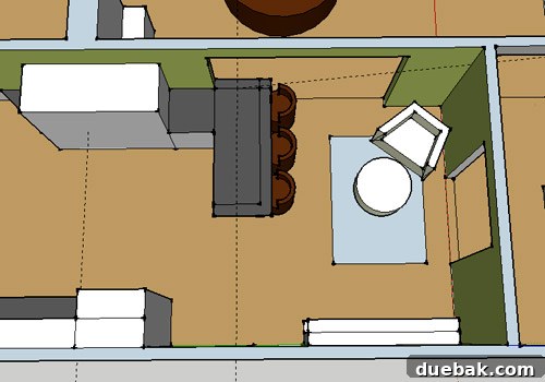 Kitchen layout highlighting the new peninsula and a cozy corner by the fireplace