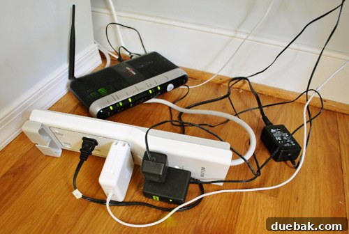Crown Your Cabinets: An Easy Molding Installation Guide 11 My messy desk with visible cords and router before organization