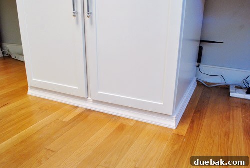 Crown Your Cabinets: An Easy Molding Installation Guide 9 Newly installed trim on office desk cabinets