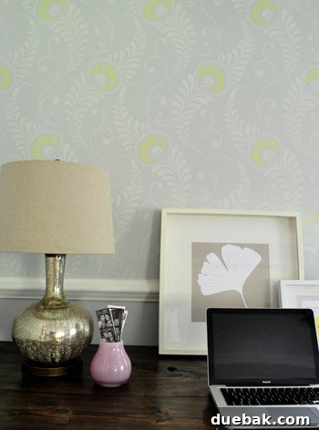 Wall Stenciling Secrets and Stunning Transformations 2 Elegant feather-patterned stencil detail above the chair rail in a home office, showcasing DIY wall decor