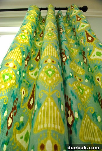 Mastering Chair Painting 13 A close-up shot of the patterned fabric, showing its texture and vibrant design, chosen for the chair seats.