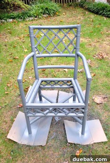 Mastering Chair Painting 8 A close-up of a primed chair, showing a smooth, even base coat applied before the final paint color.