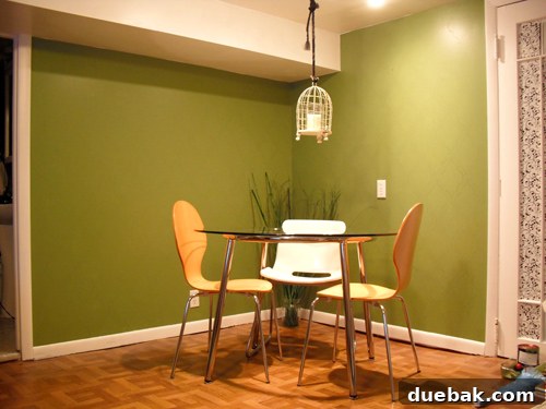 Image showing the initial green paint applied to the dining nook wall