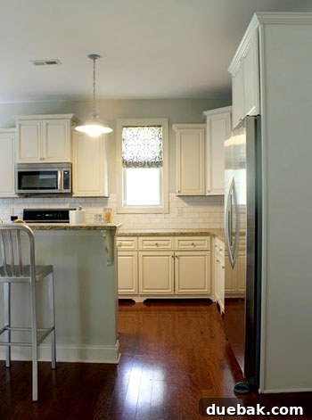 Inspirational kitchen design with cabinets and decorative trim