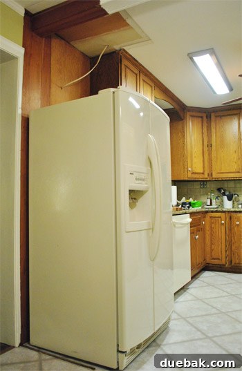 Current state of the kitchen after fridge cabinet demolition