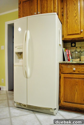 Close-up of the small kitchen refrigerator opening