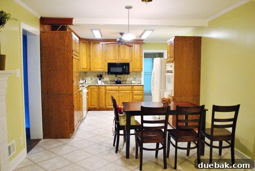 Revolutionize Your Kitchen: Smart Cabinet and Appliance Relocation 15 Temporary kitchen setup with old fridge in new spot
