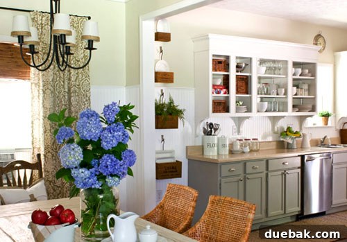 Kitchen Wall Ideas: Tile and Open Shelves 3 Kitchen with open shelving displaying dishes and glassware, showcasing an accessible and stylish storage solution.
