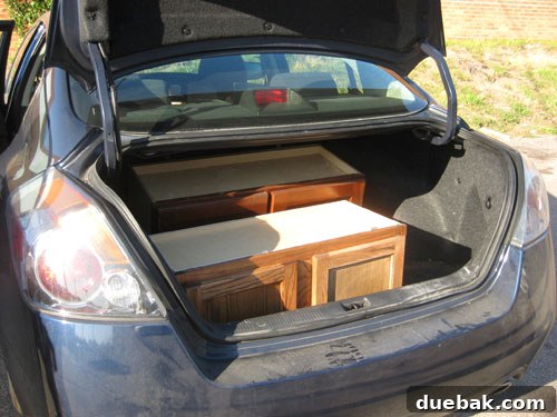 Cabinets loaded into a car for transport
