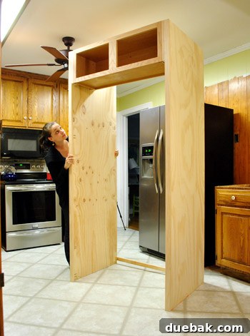 DIY Built-In Refrigerator Installation 14 The built-in refrigerator enclosure standing upright, ready to be moved into place