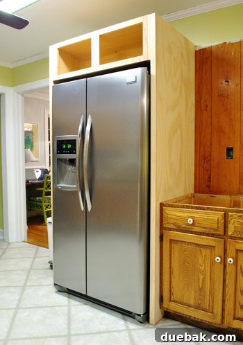 DIY Built-In Refrigerator Installation 15 The built-in refrigerator enclosure slid into place over the refrigerator in the kitchen