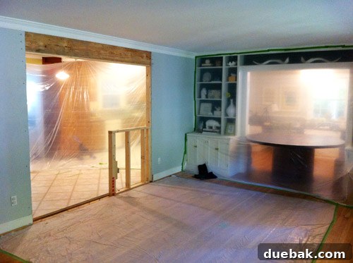 Unfinished dining room opening after wall demolition