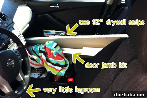 Long drywall pieces extending through the car interior