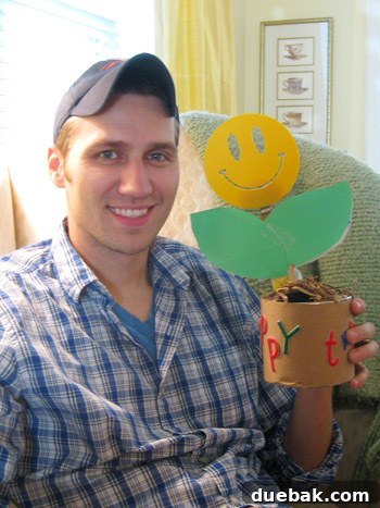 The Zero Three Directive 3 Creative birthday gift from mom: a 'flower' made of gift cards, a happy face spatula, and running socks