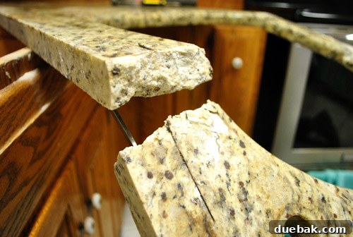 Metal rod under granite