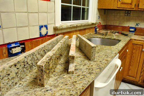 Granite countertop being pried