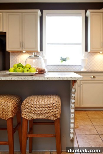 Kitchen Island Makeover with Brackets 6 Detailed view of the kitchen island with custom decorative corbels and updated hardware