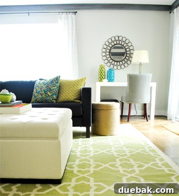Rug Refresh Transforming Our Living Room 11 Stylish new accent chair positioned in the living room