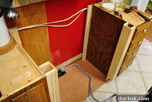 Optimize Your Kitchen: Filling Stove-Side Cabinet Gaps 12 Close-up of final snug fit with stove in place